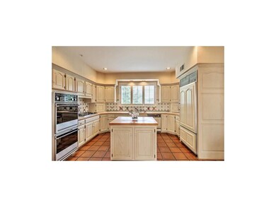 Kitchen with hand painted tile from Spain