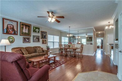 Beautiful hardwoods throughout living room, dining area and hallway to bedrooms & baths