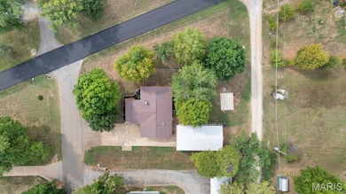 Aerial view of property and surrounding area