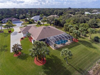 Aerial shot of grounds, pool and RV Boat pad.  Liv