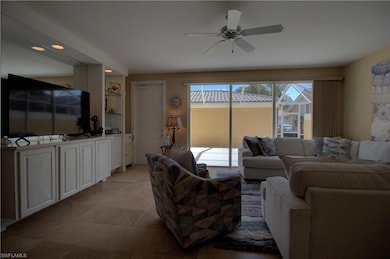large great room with extended tile and wall unit