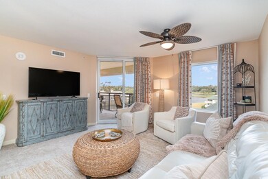 Living room featuring plenty of natural light, cei
