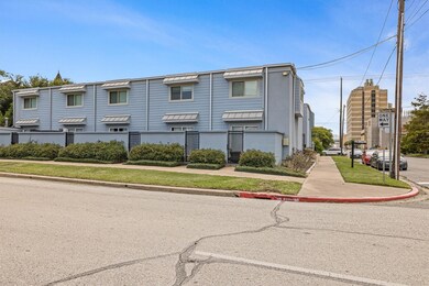Corner lot townhome just blocks from UTMB! Gated e