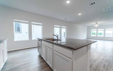 Kitchen with visible vents, light wood-type floor