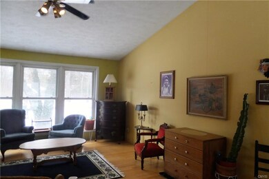 Living room with cathedral ceilings and newer doub