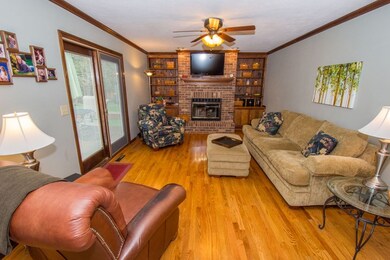 Beautiful flooring, gas log fireplace and slider o