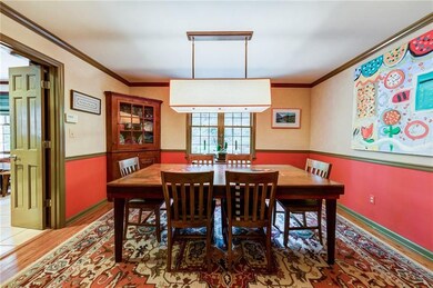 Large formal dining room ready for your family din