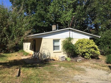Parking area at side of house