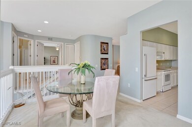 Dining area  nicely furnished, featuring light col