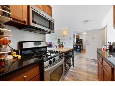 The galley style kitchen has been updated to featu