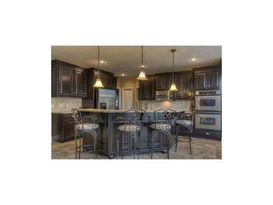Gourmet Kitchen with Custom Cabinets & Granite