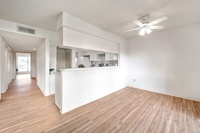 Dining area features a new (2025) ceiling fan.