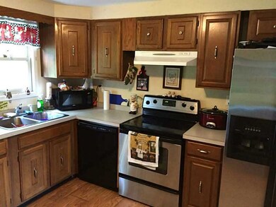 Kitchen. The right side unit has stainless applian