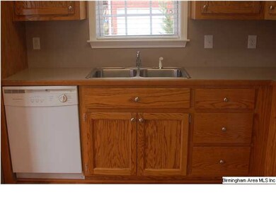 Great kitchen counter and cabinet space. Be sure to open the pantry door, tons of room for all of your couponing deals.