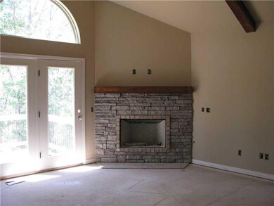 Living Room. Stone Gas Log Fireplace