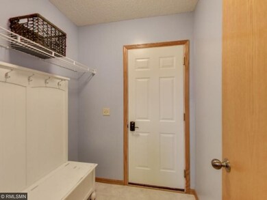 Mudroom off of the three car garage. Place to take