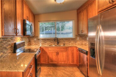 Updated kitchen features stainless steel appliance