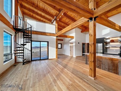 Dining Area with Soaring Ceilings and Floor to Cei