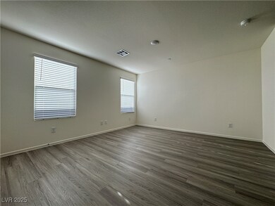 Unfurnished room featuring dark wood-style floors