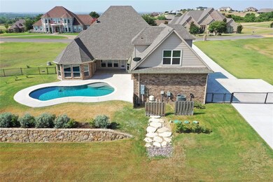 Expansive pool area with plenty of room for outdoor kitchen and living space.