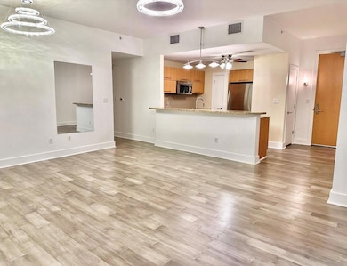 Unfurnished living room featuring light wood-styl