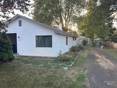 Rear view of house with a chimney