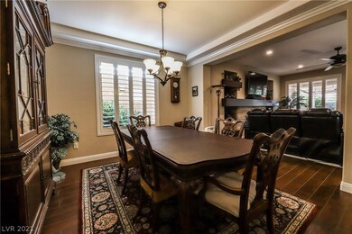 Formal dining room features shutters, tile floorin