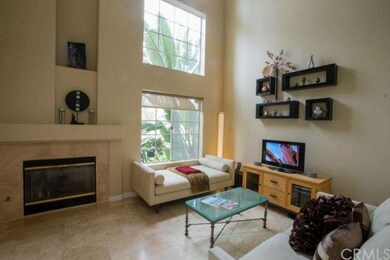 Stone floors accented on the fireplace surround ma