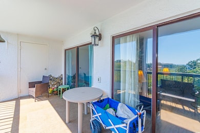 View of patio / terrace with a balcony