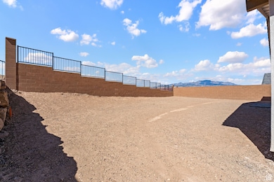 View of fenced backyard