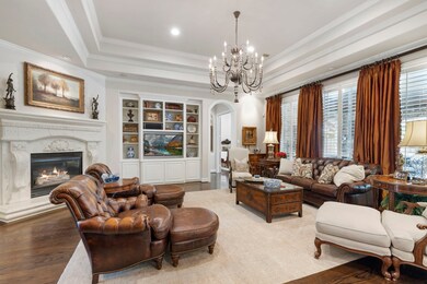 Family Room with Fireplace and custom Built-ins.