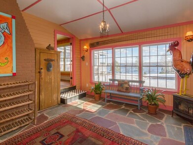 A gas stove keeps this room warm and...