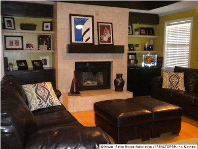 Full Length Travertine Fireplace and Built-Ins in 