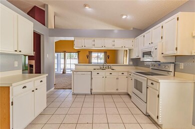Kitchen overlooking Living Room