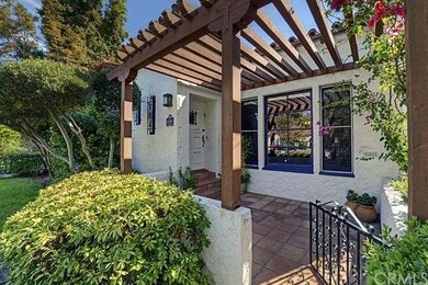 Wood pergola at front entrance.