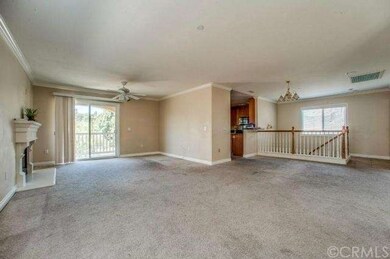 LIVING AREA LEADS OUT TO BALCONY OR DOWN TO BEDROO