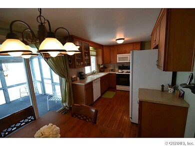 Kitchen. 2012 maple/ solid surface kitchen.