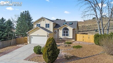View of property with a garage