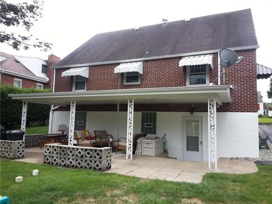 Rear View of home with patio