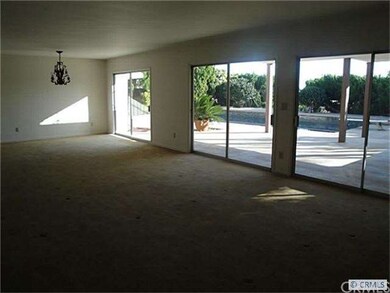 Living/Dining with big sliding doors leading to ou