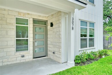 Property entrance with board and batten siding