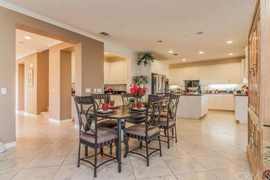 Foyer leading into your kitchen, family room and b