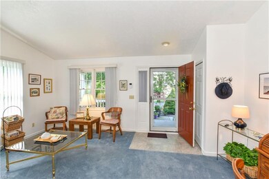 The front door opens to a formal living room.