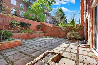 Extra large patio with built-in planters. Perfect