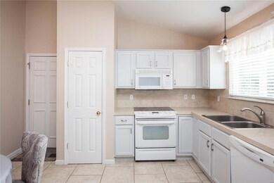 Pantry, built in microwave and electric cooktop