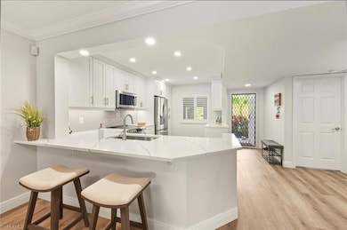 7772 Emerald Cir unit 101, Naples, FL 34109 - photo 6