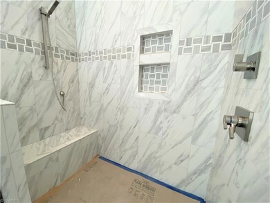 Here is the large custom shower that has a glass door.