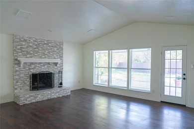 Hall with wainscoting and dark wood-type flooring