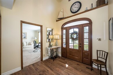 The charming front door and foyer was improved in the last years by Mosby Design and Construction.