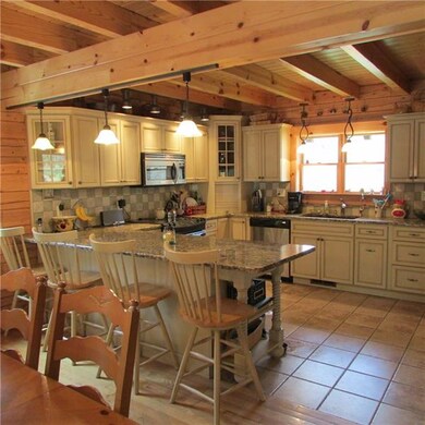 Stunning open beam ceiling throughout the home.Cus
